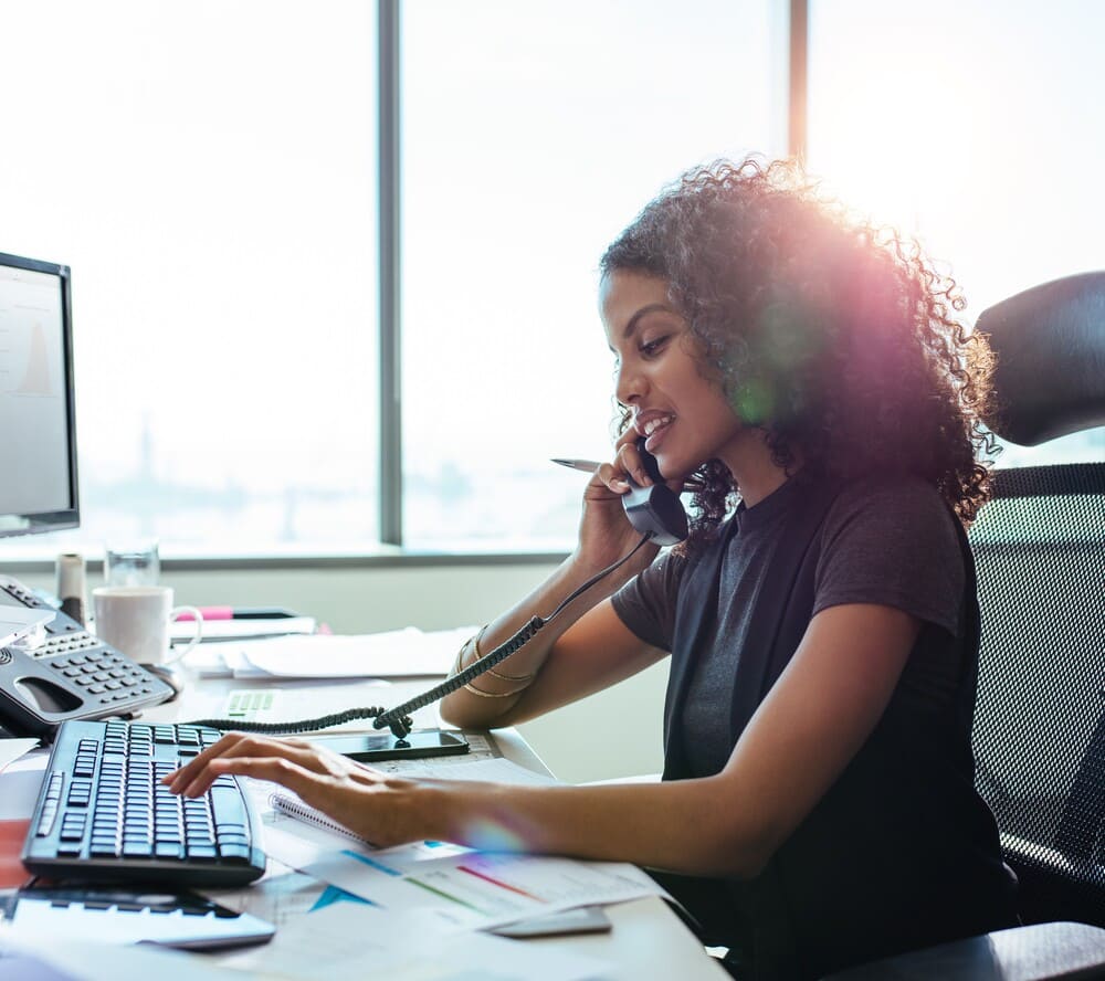 black woman talking to customer